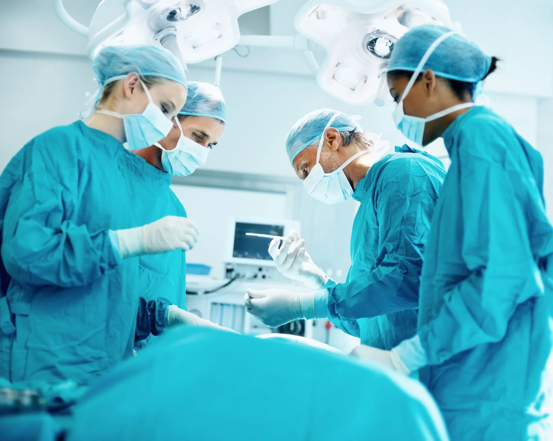 Photo of surgeons in operating room